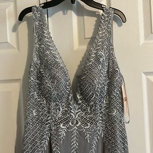 Beautiful embroidered low cut thigh slit gray